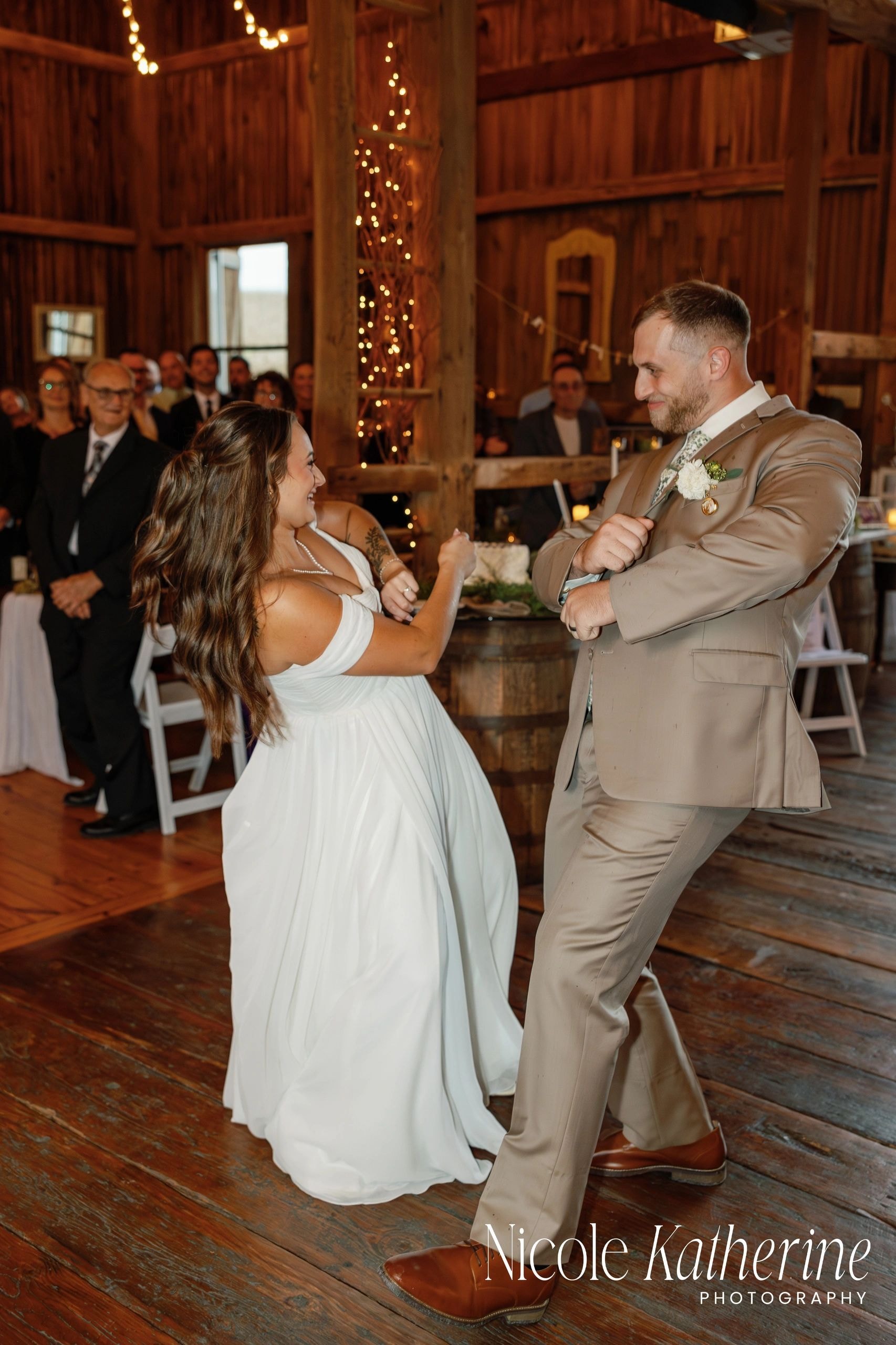 Bride and groom first dance barn wedding