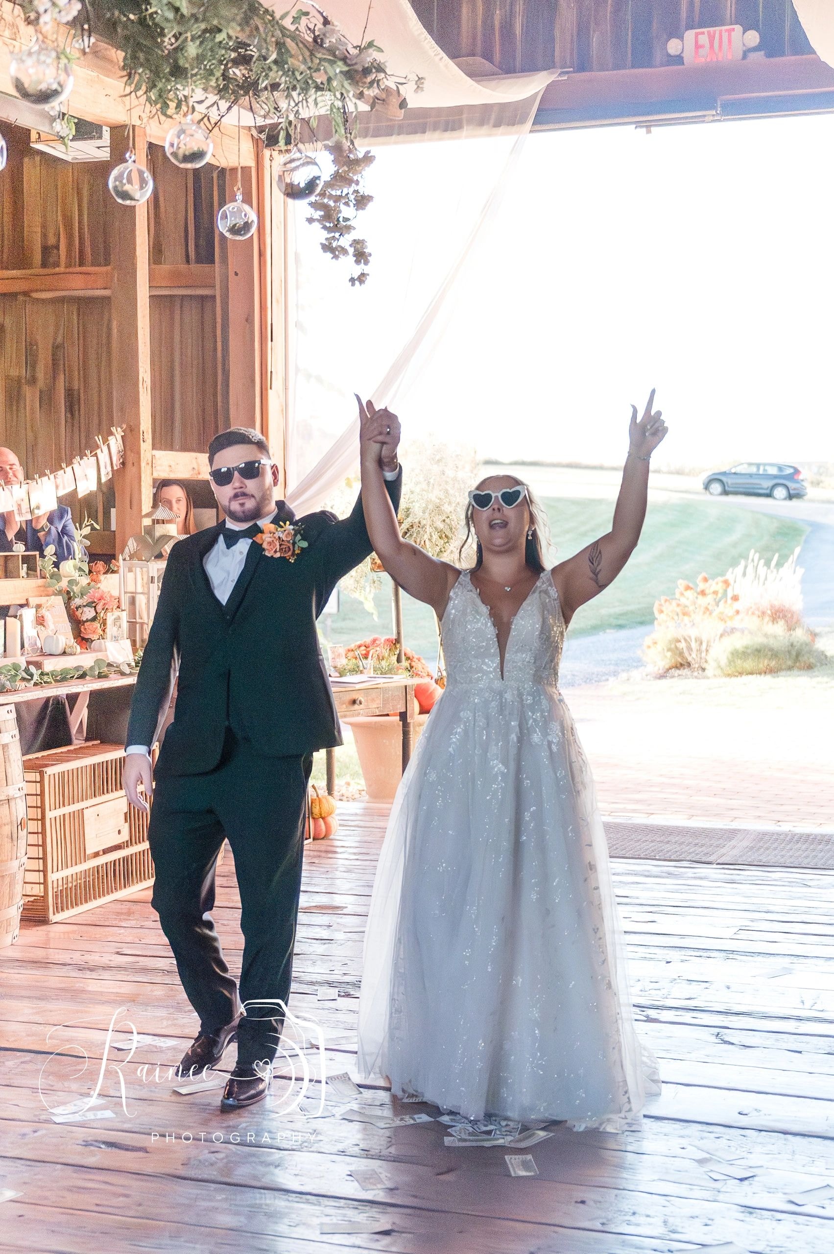 Bride and groom celebrating wedding reception outdoor