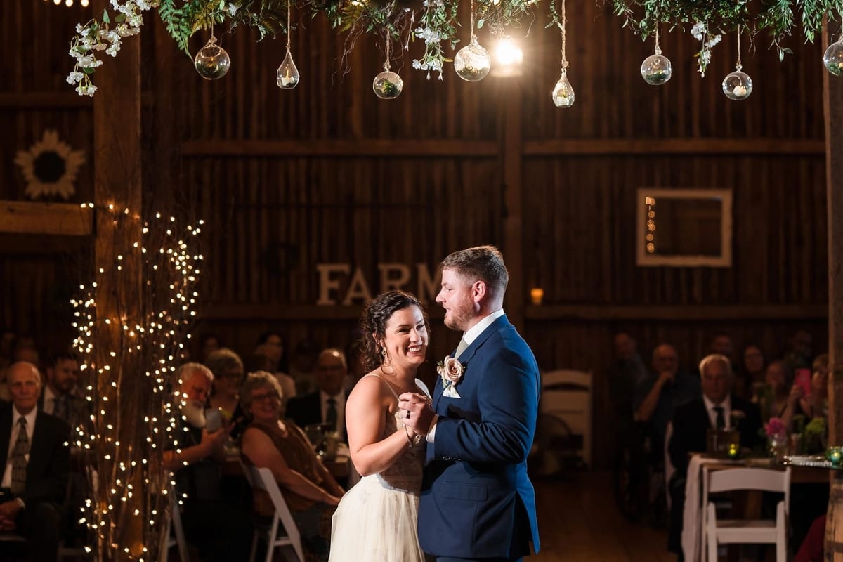 Bride and groom first dance barn wedding