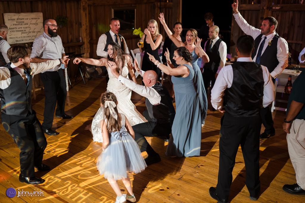 Energetic wedding reception dance floor celebration