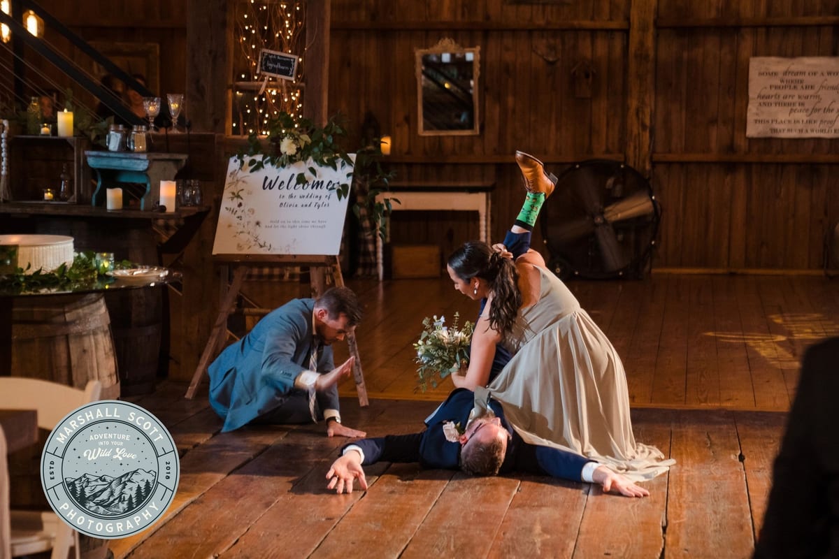 Bride and groom playful moment rustic barn wedding