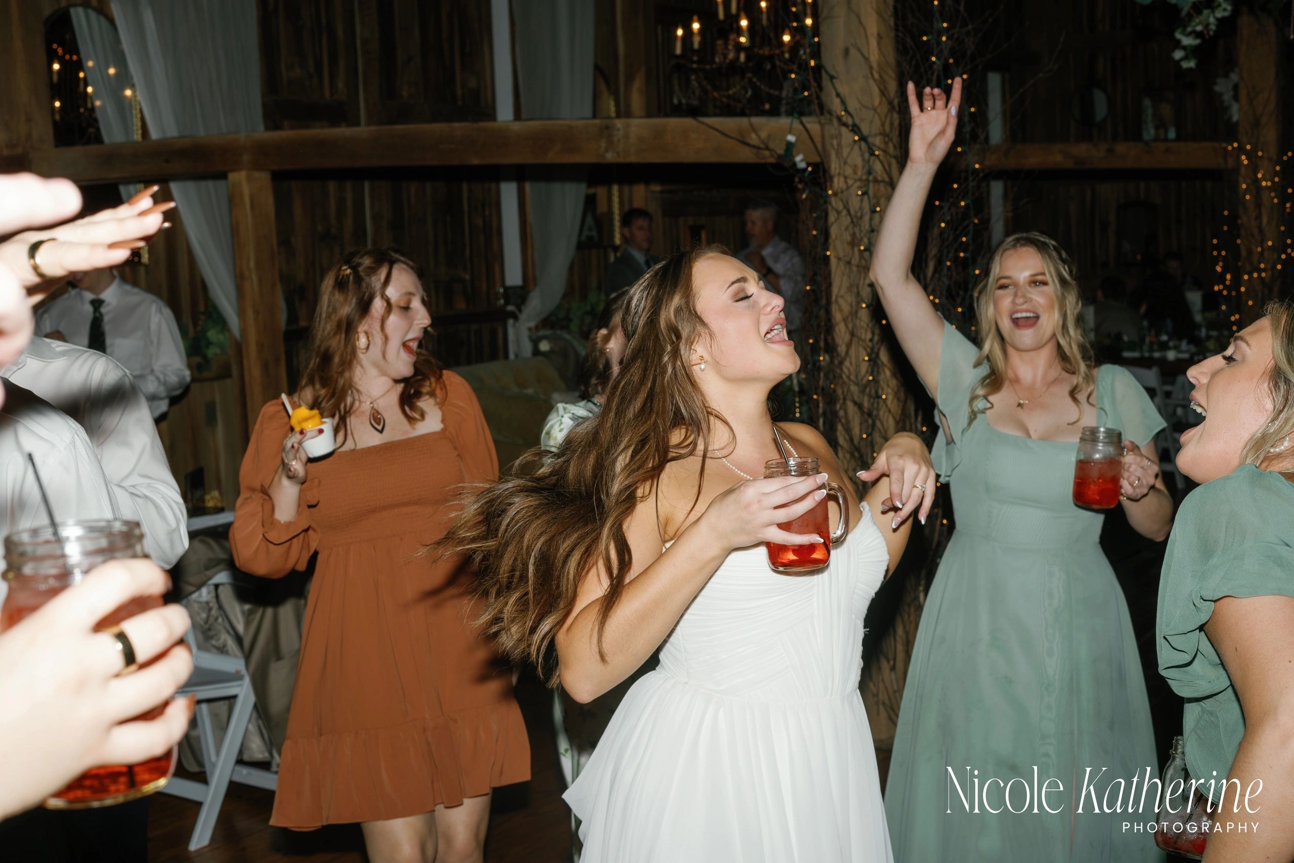 Women dancing at elegant indoor party celebration